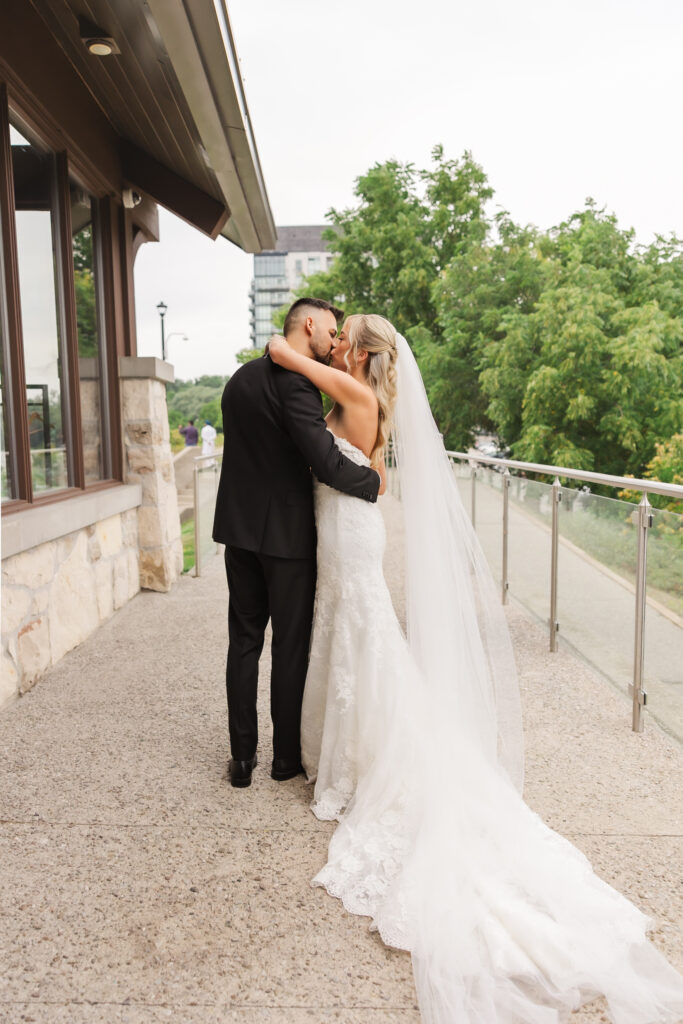 bride and groom at cambridge mill wedding 