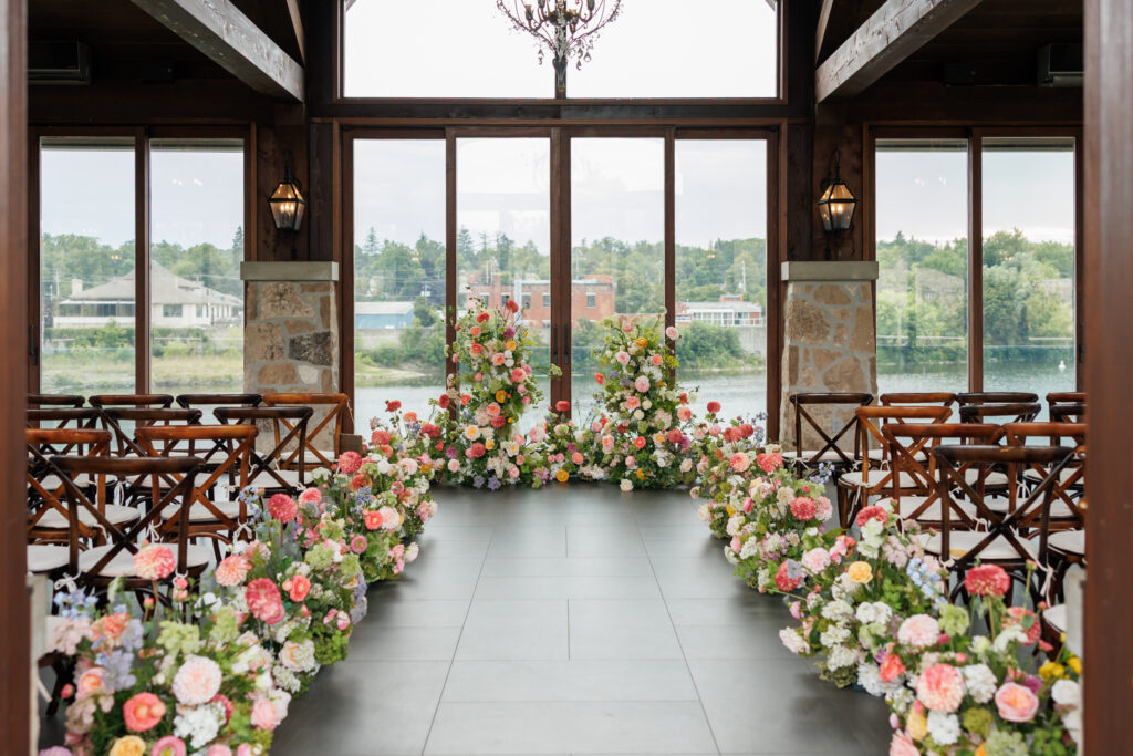 Elegant Cambridge Mill wedding ceremony décor captured by Ontario wedding photographer.