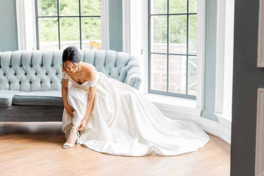 Editorial portrait of bride inside harding waterfront estate, captured by Ontario wedding photographer.
