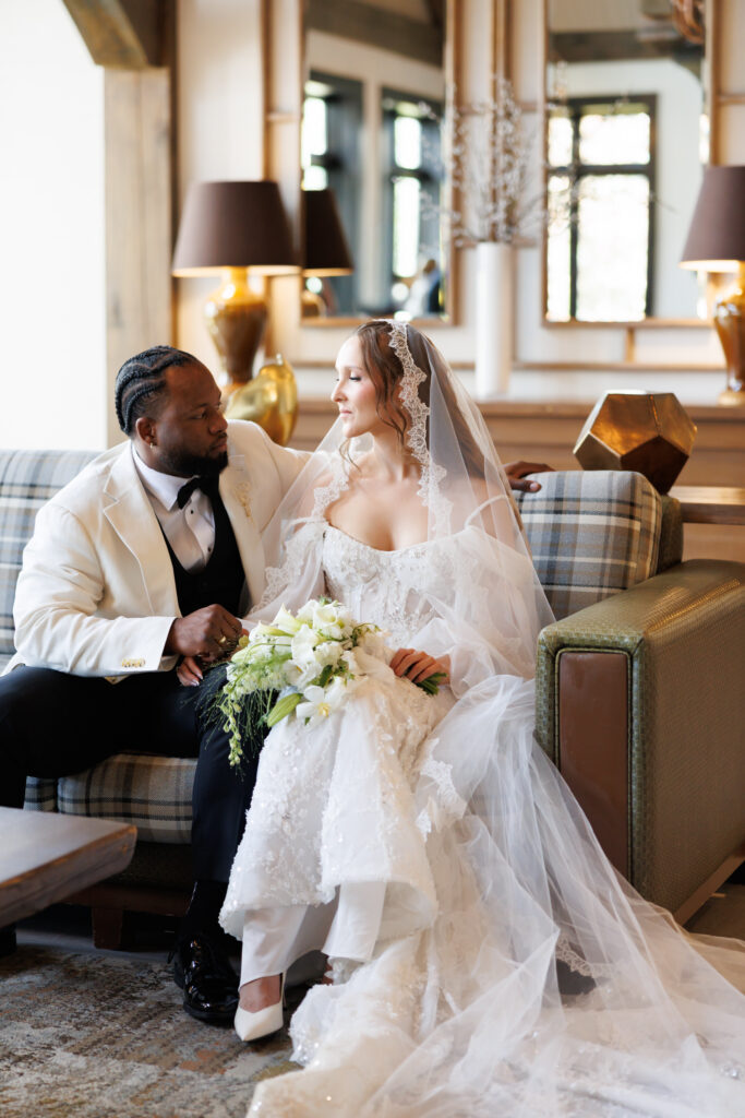 Bride and groom sitting together at Whistle Bear Golf Club wedding in Cambridge, Ontario. Editorial, true-to-colour wedding photography.