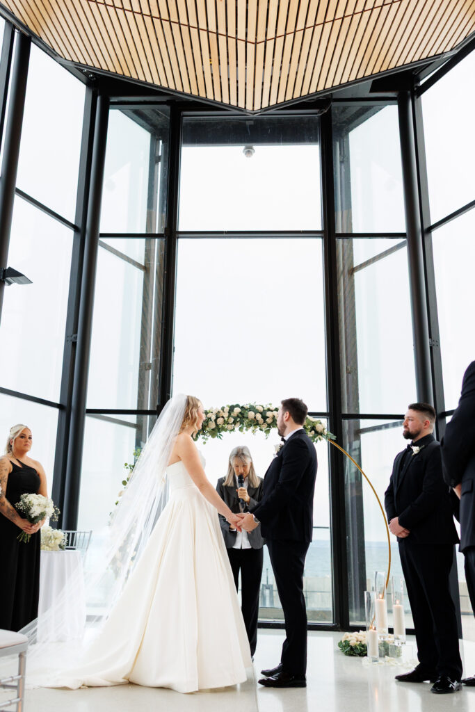 couple at ceremony space at spencer's at the waterfront