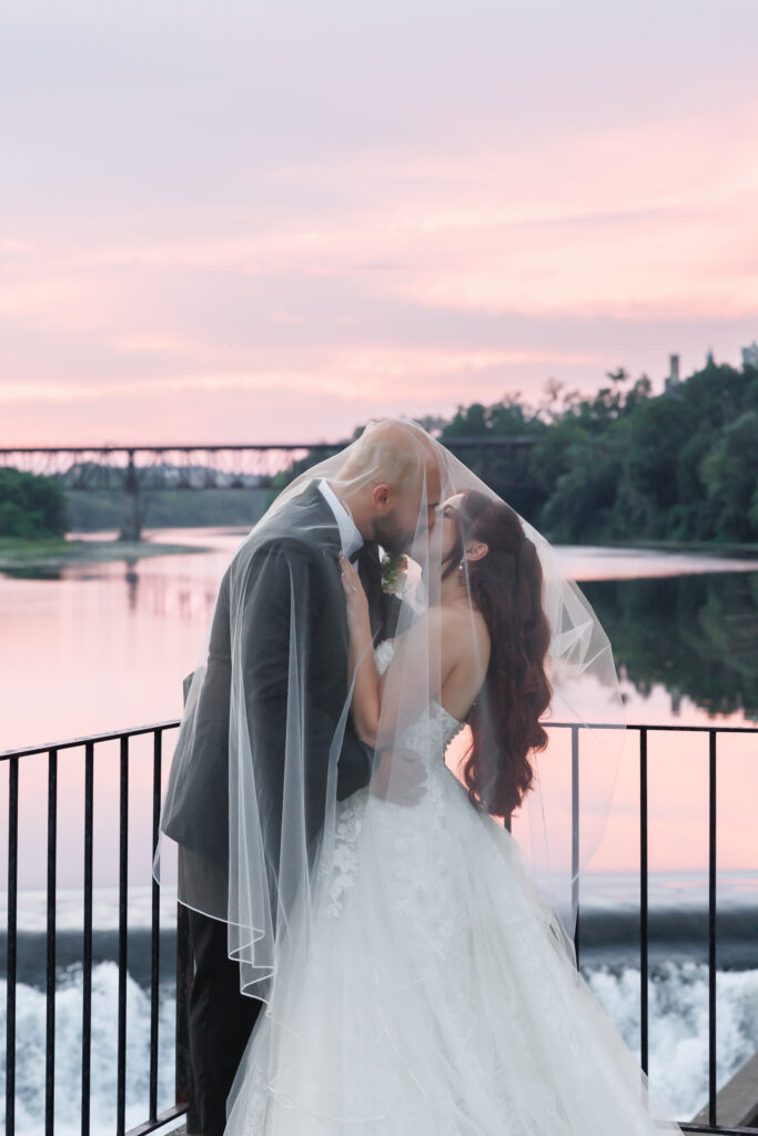 sunset couples portraits on cambridge mill balcony over looking grand river