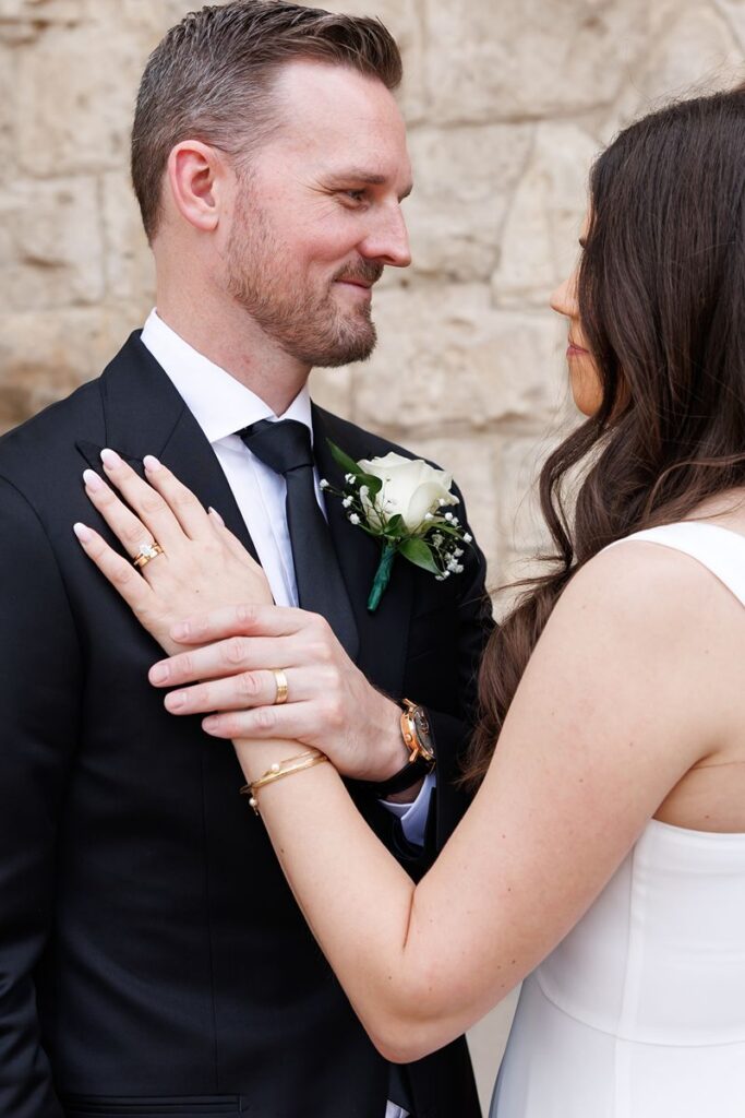 close up photo of couple and their wedding rings