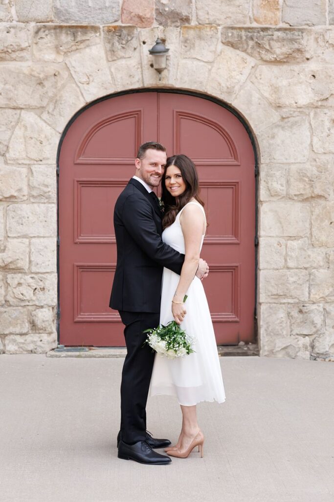 couple outside of cambridge city hall wedding 