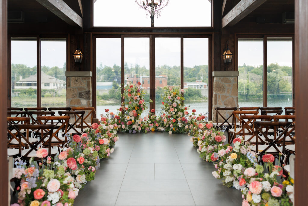 ceremony set up on the glass pavilion at cambridge mill 
