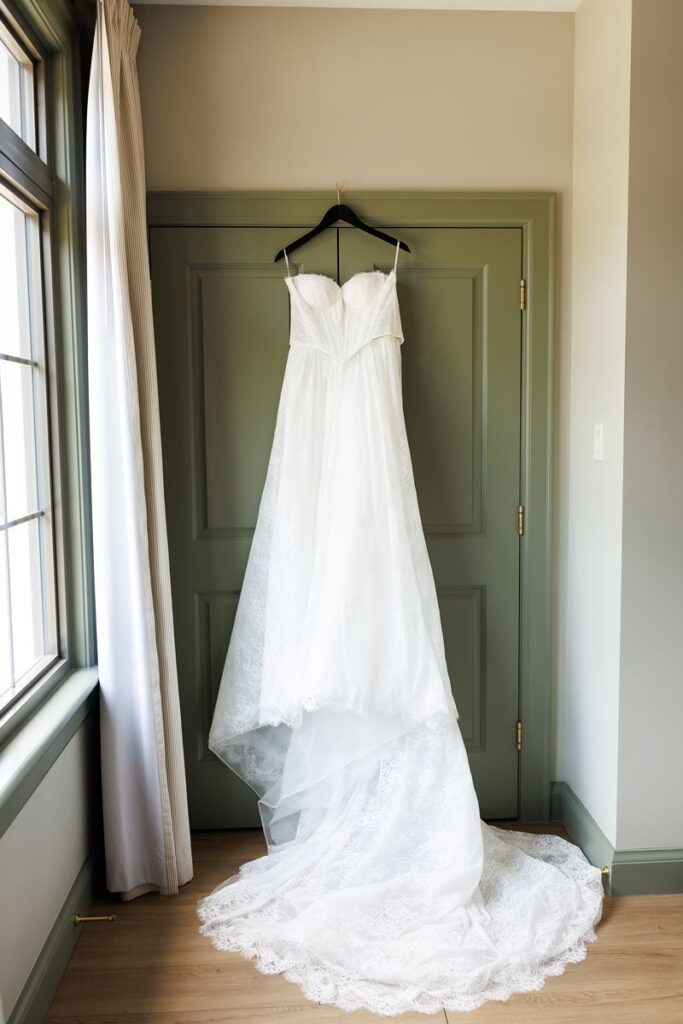 weddiong dress hanging at the penrose wedding suites in st. marys