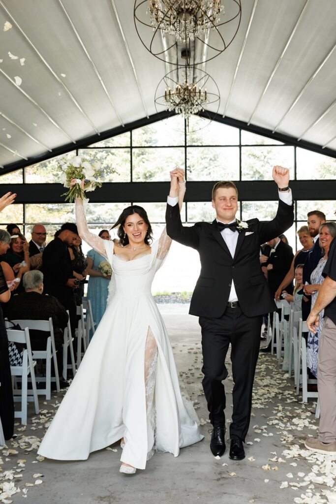 couple exiting the whistle bear garden chapel
