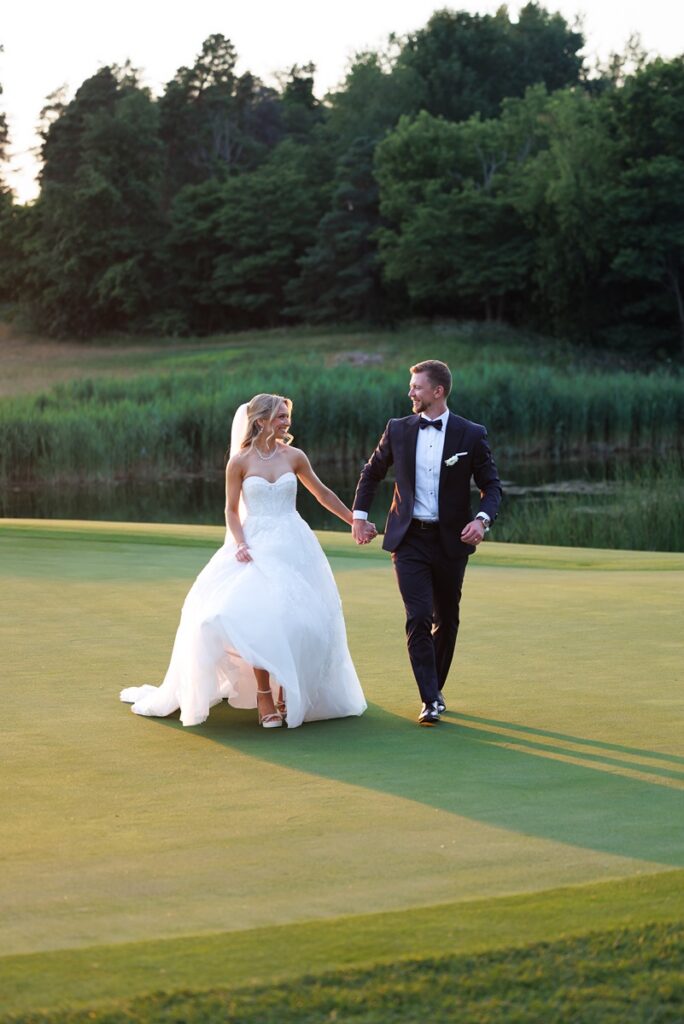 Bride and groom golden hour sunset portraits in field at TPC Osprey Valley Caledon